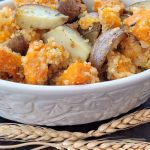 Butternut Squash and New Potatoes in white baking dish