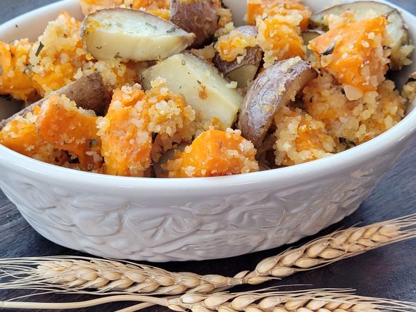 Butternut Squash and New Potatoes in white baking dish